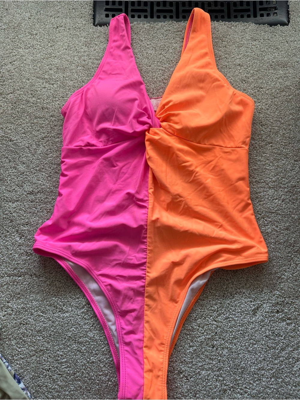 Pink Lily Two-Tone Twist One-Piece Swimsuit in Hot Pink and Bright Orange